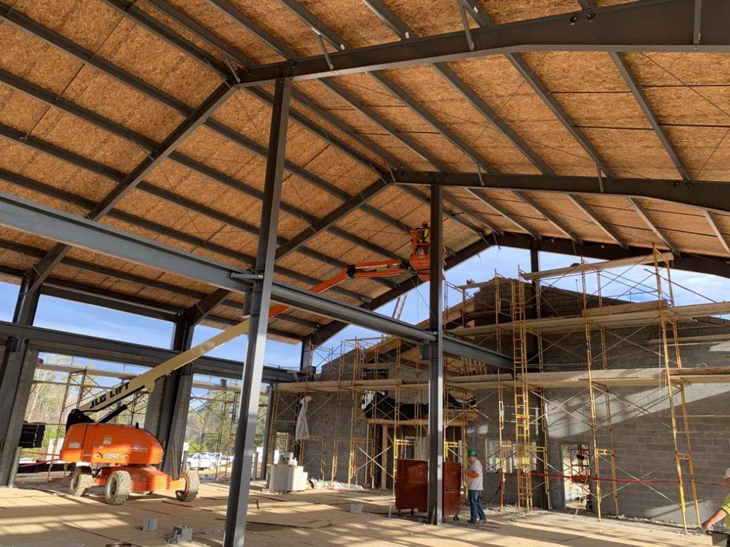 underneath the structural insulated panel roof on a commercial construction site