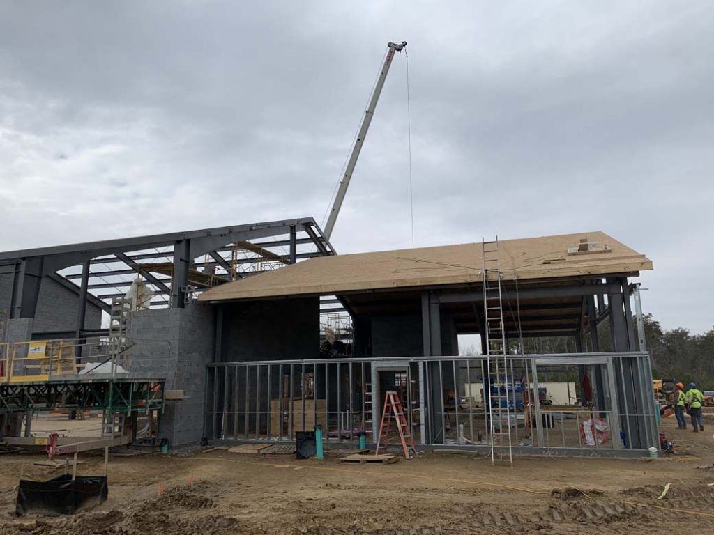 structural insulated panels being installed on a commercial construction site
