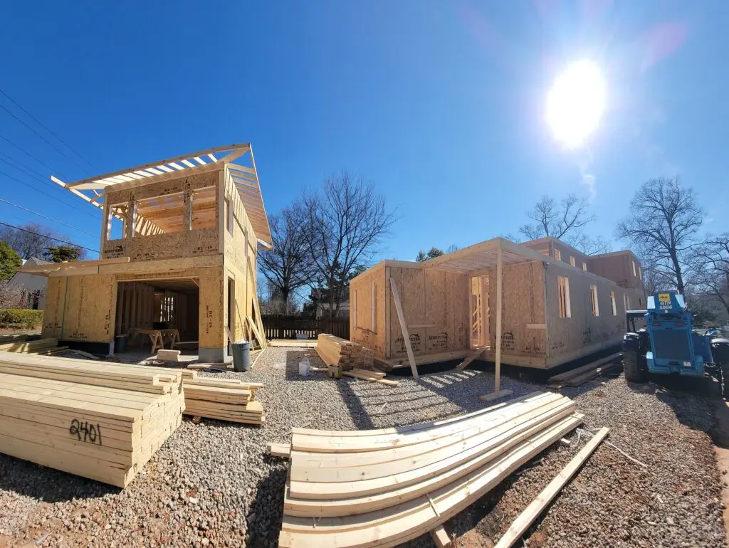 The main house and separate carriage house being framed together with SIP panels on a Charlotte, NC lot